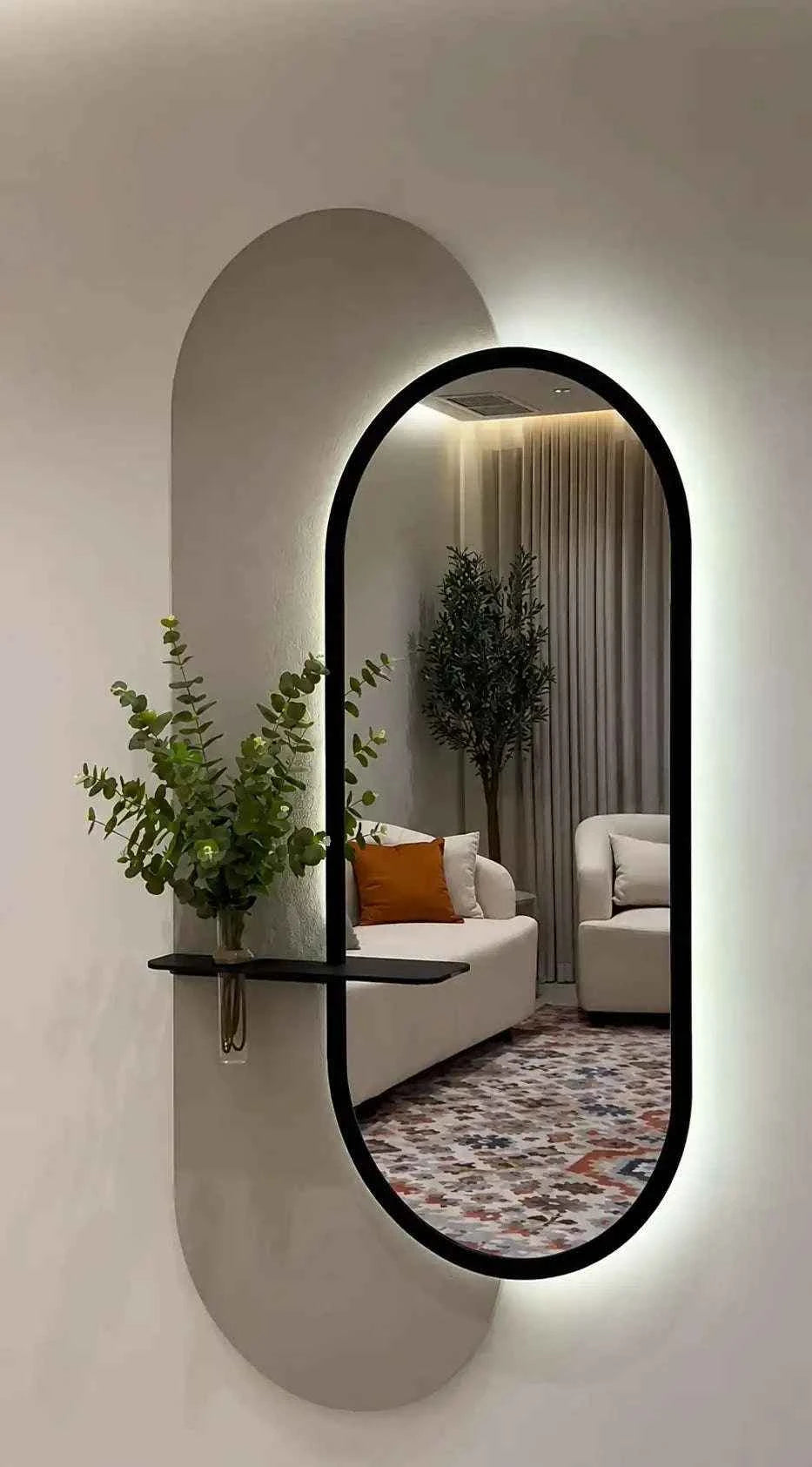 مرآة جدارية فاخرة بإطار أسود وإضاءة خلفية – تصميم عصري أنيق