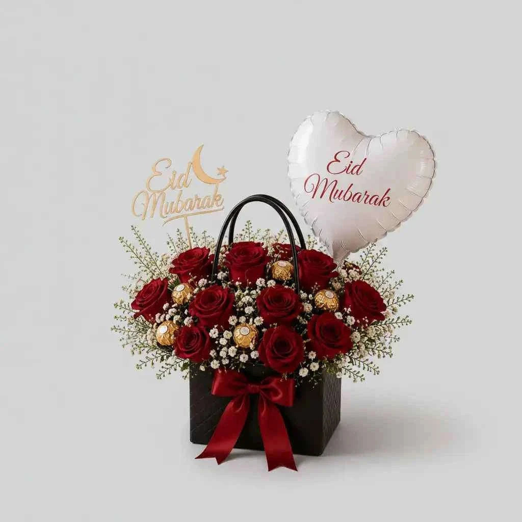 ورود حمراء لعيد مبارك مع فيريرو روشيه وبالون قلب flowerna