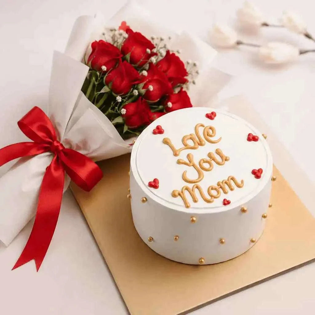ورود حمراء مع كعكة أحبك يا أمي بكتابة ذهبية وجيبسوفيلا flowerna