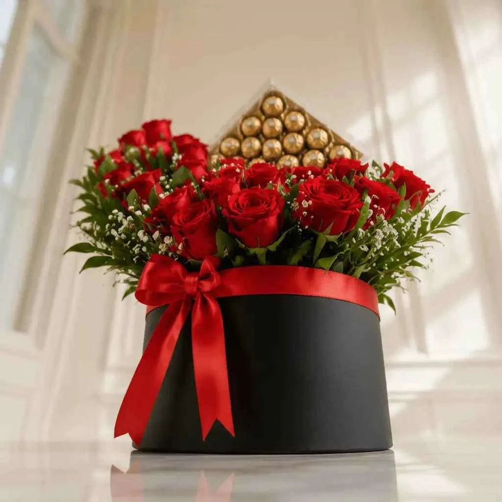 ورود حمراء زاهية مع صندوق شوكولاتة فيريرو روشيه flowerna
