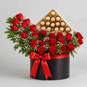ورود حمراء زاهية مع صندوق شوكولاتة فيريرو روشيه flowerna