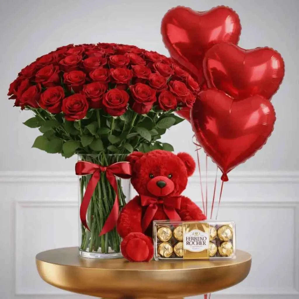 ورود حمراء مع دمية دب وفيريرو روشيه وبالونات قلب flowerna
